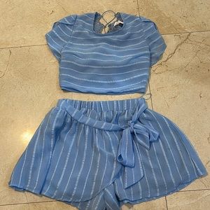 Beautiful, 2 piece, blue top and shirts. Can be dressed up or down. Size small